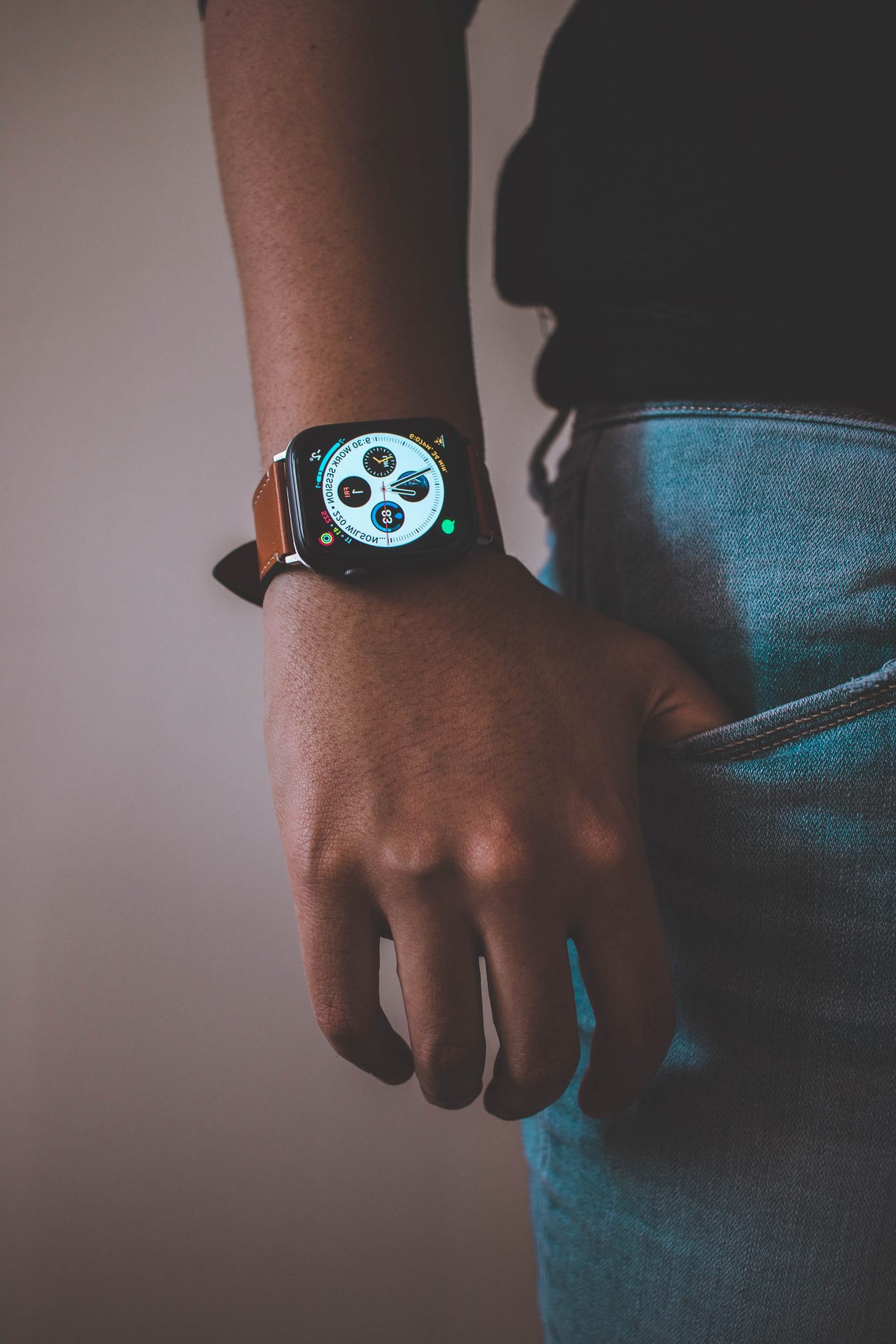 Men wearing wearable wristband (apple watch)